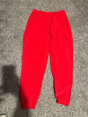 Lululemon red adapted state perforated joggers with Branded Tag